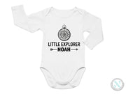 a white bodysuit with the words little explorer noah on it