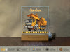 a wooden block with a picture of a dump truck