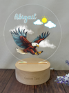 a wooden stand with a picture of an eagle on it