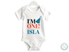 a baby bodysuit with the words i&#39;m one island printed on it