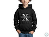 a young boy wearing a black hoodie with the letter x on it