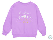 a purple sweatshirt with the words carolina on it