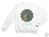 a white sweatshirt with a colorful peacock on it