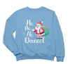 a blue sweatshirt with a santa clause on it